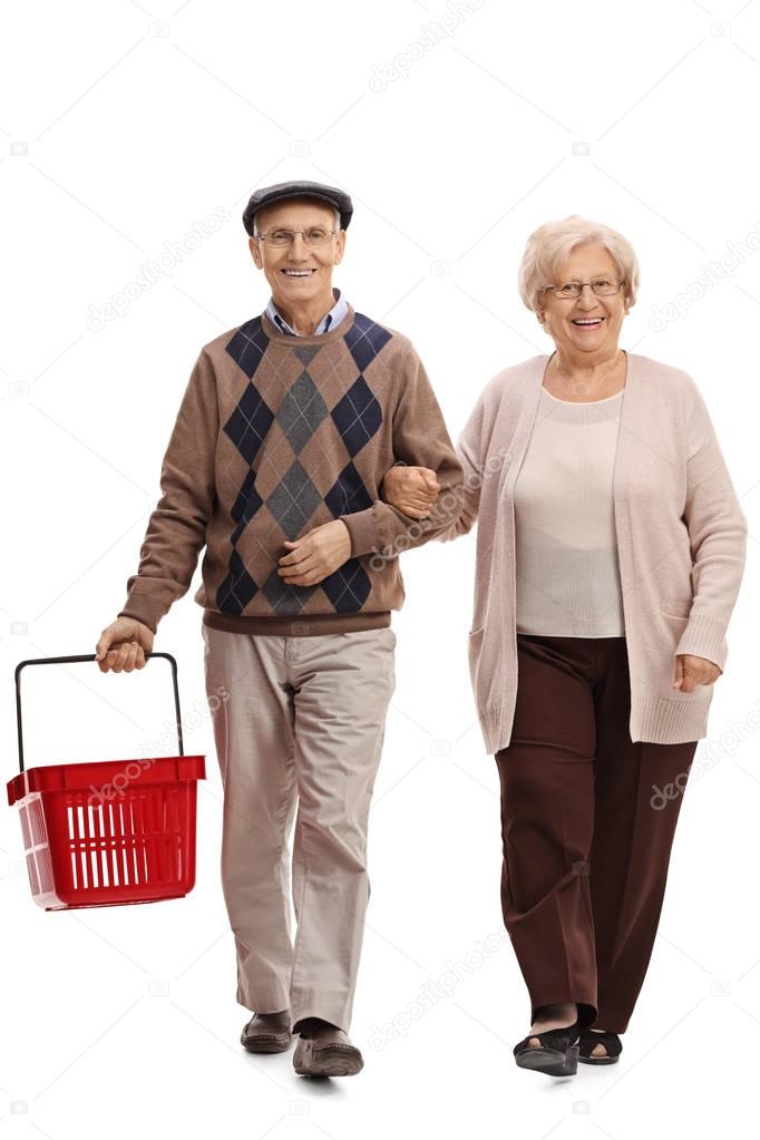 senior couple with an empty shopping basket 