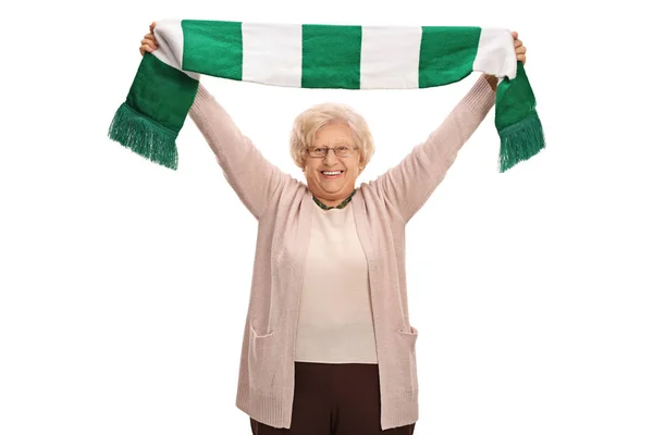 Överlycklig äldre fotbollsfan håller en halsduk — Stockfoto