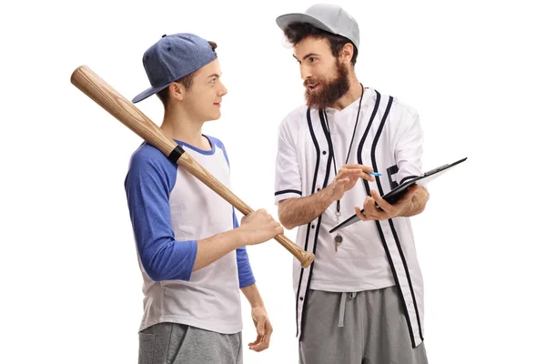 Treinador de beisebol aconselhando um jogador de beisebol adolescente — Fotografia de Stock