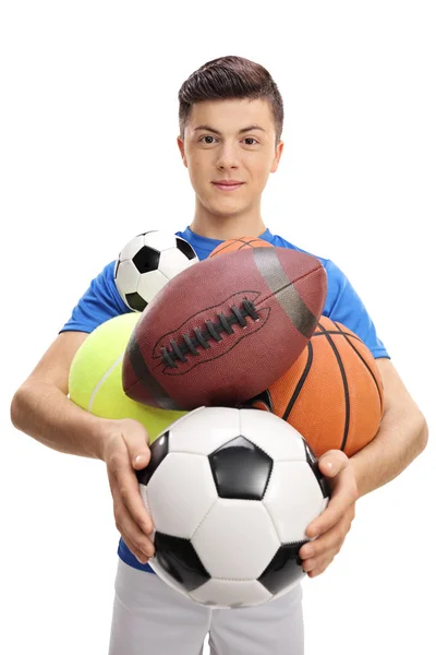 Atleta adolescente con diferentes tipos de pelotas deportivas —  Fotos de Stock
