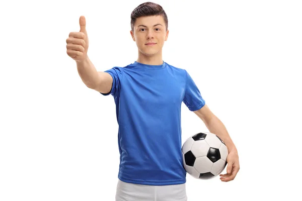 Teenage fotbollsspelare att göra en tumme upp skylt — Stockfoto