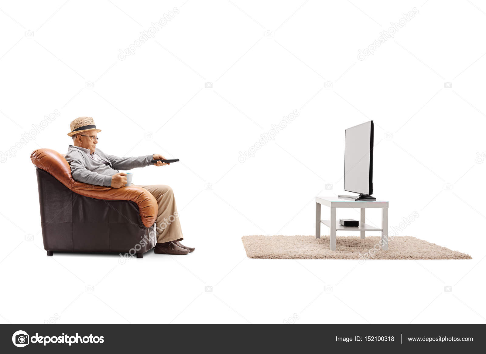 Man sitting in an armchair and watching television — Stock Photo