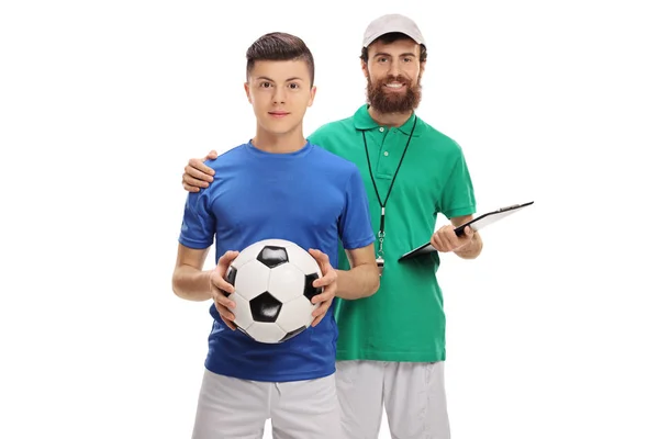 Fotbollstränare med teenage spelare — Stockfoto