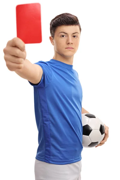 Jogador de futebol adolescente mostrando um cartão vermelho — Fotografia de Stock