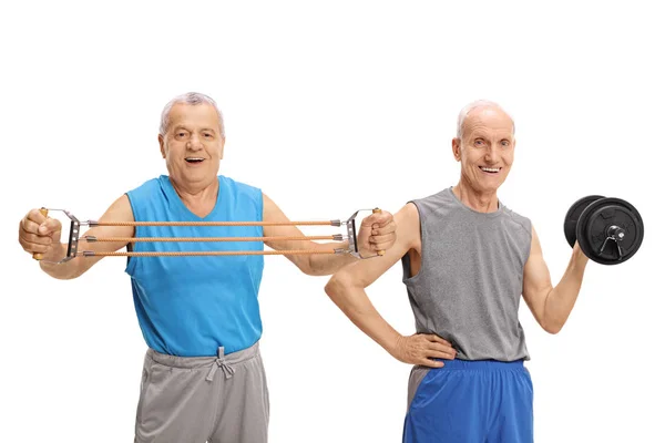 Volwassen mannen trainen met weerstand band en halters — Stockfoto