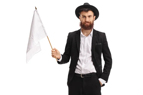 Skäggig man med en vit flagga — Stockfoto