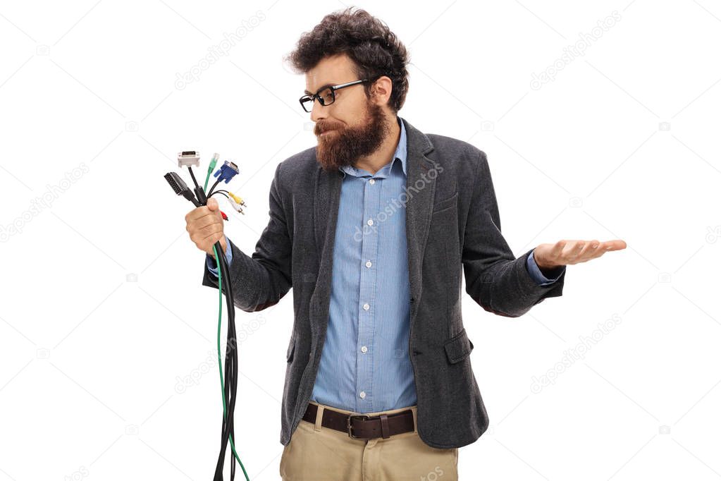 man holding different types of electronic connectors