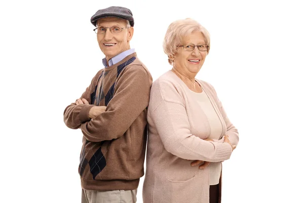 Seniorer stående rygg mot rygg — Stockfoto