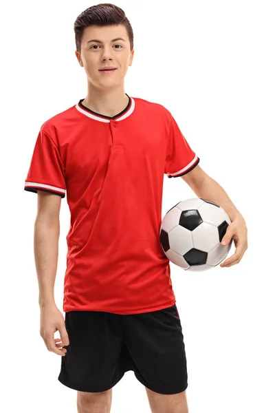 青少年足球运动员在一个红色的球衣 — 图库照片