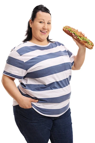 Mulher com excesso de peso com um sanduíche — Fotografia de Stock