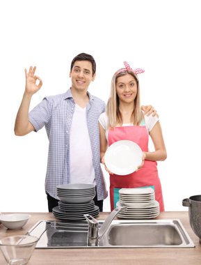 ok işareti yapmak temiz tabak yığınları ile Çift