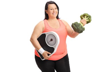 Overweight woman with weight scale and broccoli dumbbell clipart
