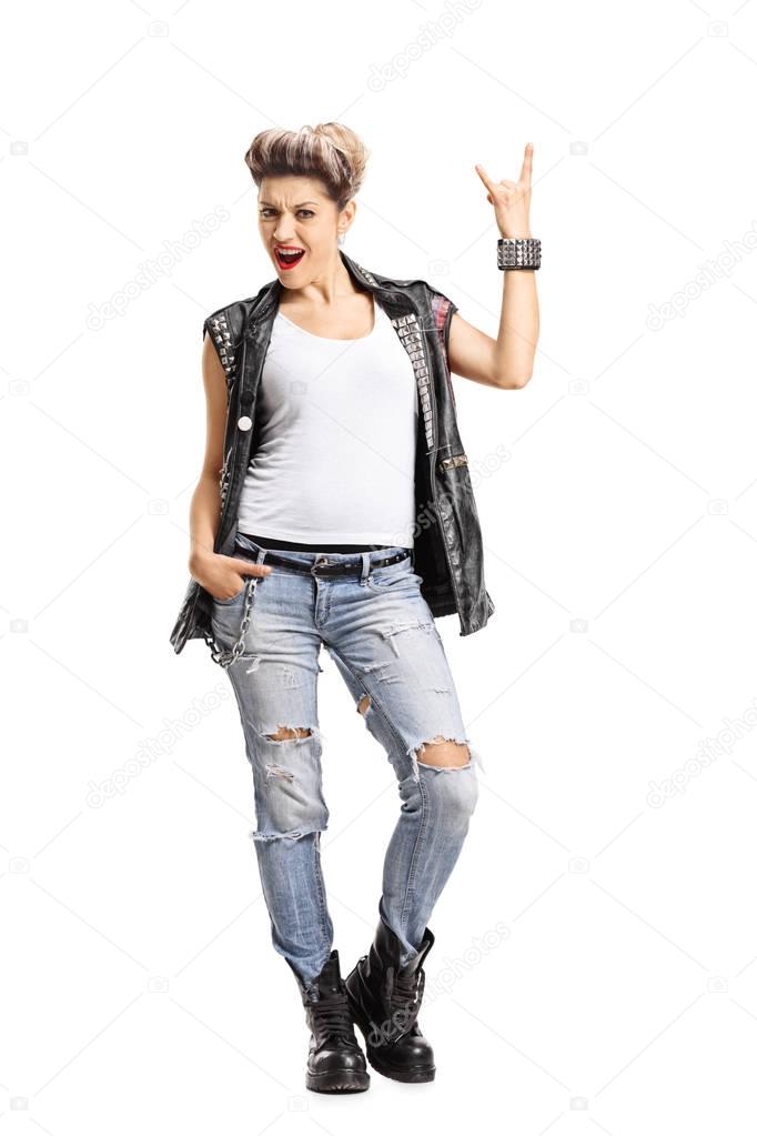 Punk girl making a rock hand gesture