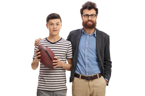 Father and son with a rugby ball — Stock Photo, Image