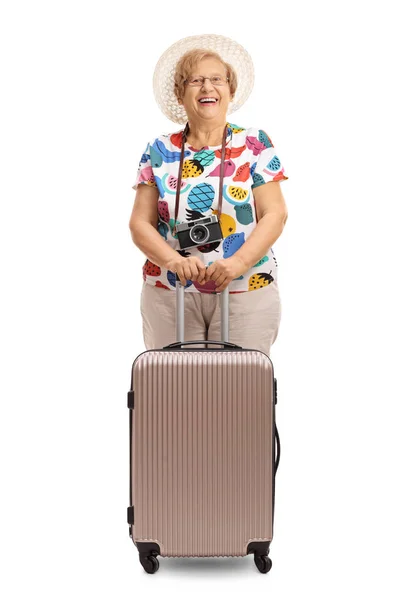 Elderly tourist with a suitcase — Stock Photo, Image