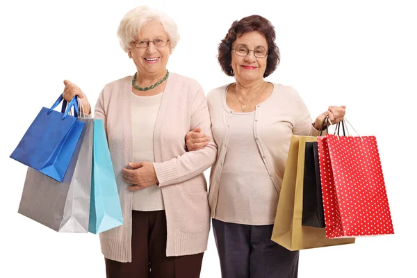 Duas mulheres maduras com sacos de compras — Fotografia de Stock