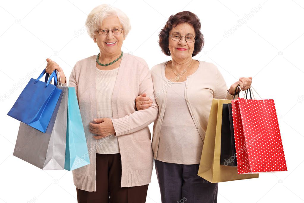 Two mature women with shopping bags