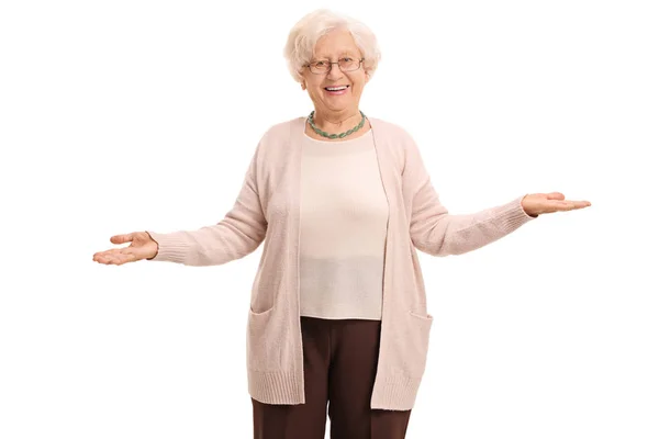 Cheerful elderly woman gesturing with her hands — Stock Photo, Image