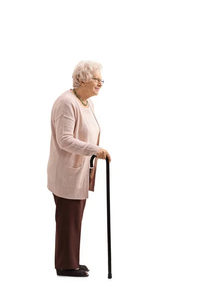 Starsza kobieta z laską w kolejce — Zdjęcie stockowe