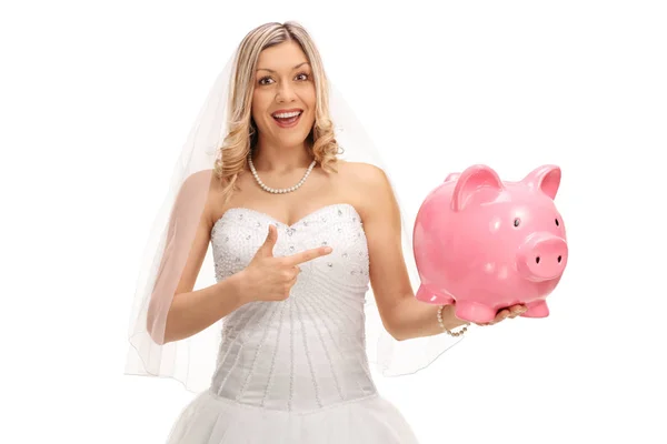 Jonge bruid een spaarpot te houden en wijzen — Stockfoto