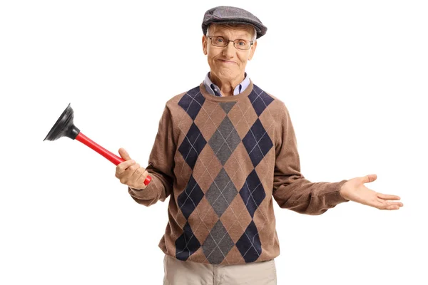 Disappointed senior holding a plunger — Stock Photo, Image