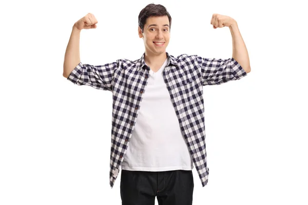 Young man flexing his muscles — Stock Photo, Image