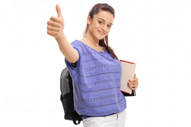 Genç öğrenci hareketi bir başparmak yapma