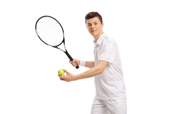 Teenage tennis player preparing to serve — Stock Photo, Image