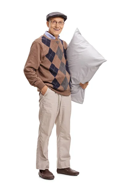 Portrait of a senior holding a pillow — Stock Photo, Image