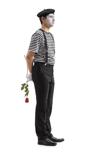 Sorgliga mime med en ros som väntar i linje — Stockfoto