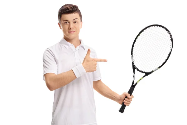 Tiener tennisser wijzen en houden van een racket — Stockfoto