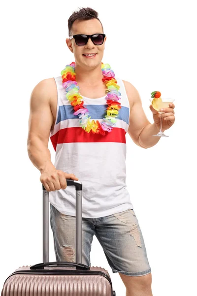 Tourist with a suitcase and a cocktail — Stock Photo, Image