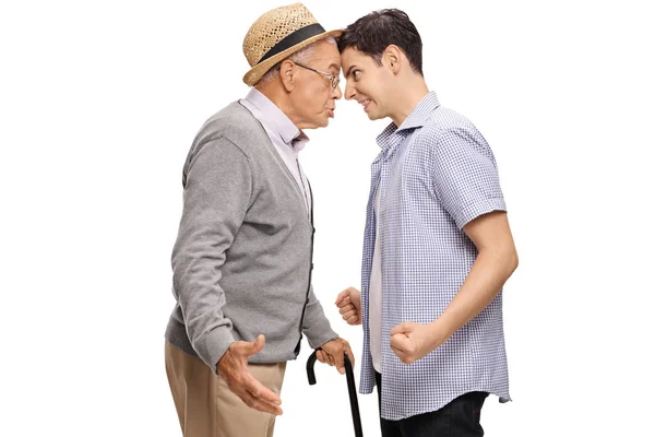 Grandfather and grandson pushing their heads against each other — Stock Photo, Image