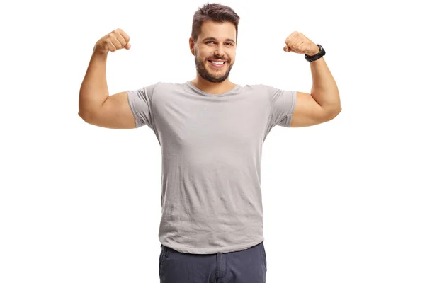 Guy buigen zijn biceps — Stockfoto