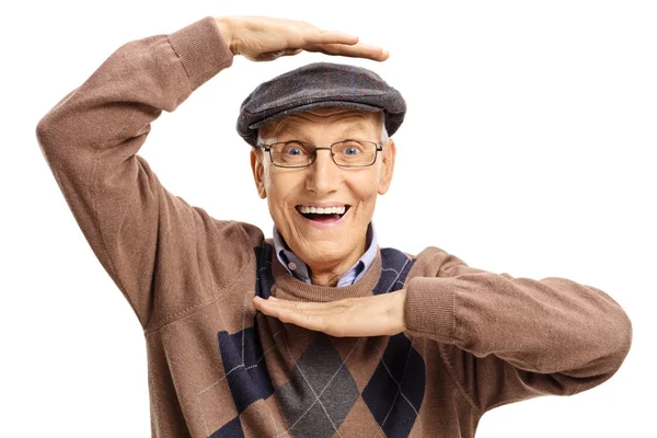 Fröhlicher älterer Mann bastelt einen Handrahmen — Stockfoto