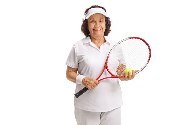 Idős teniszező és ütő a labda — Stock Fotó
