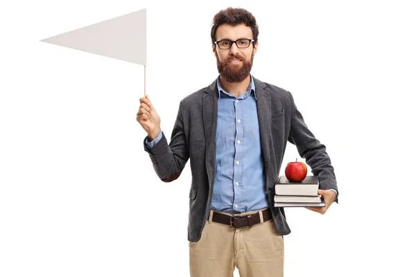 Professor holding een witte driehoekige vlag en boeken — Stockfoto