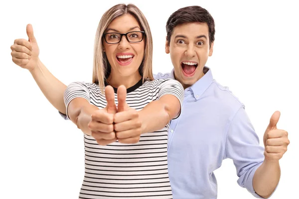Man and woman holding their thumbs up — Stock Photo, Image