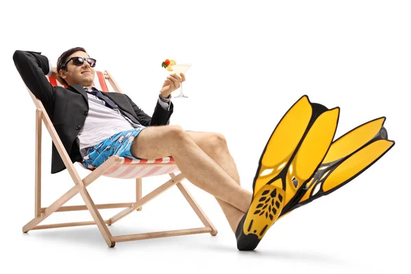 Businessman with swimming fins and cocktail Royalty Free Stock Photos
