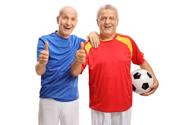 Giocatori di calcio facendo pollice su segni — Foto Stock