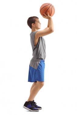 Kid throwing a basketball clipart