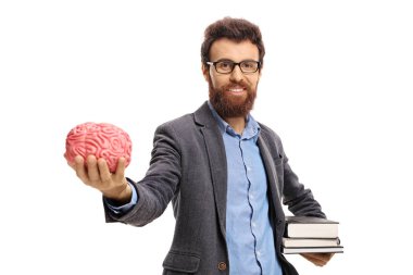 Profesör kitap ve bir beyin modeli ile
