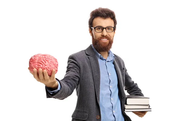 Profesor con libros y modelo cerebral — Foto de Stock