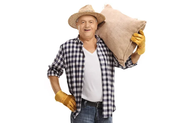 Farmer with a burlap sack — Stock Photo, Image