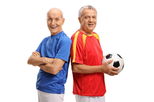 Elderly soccer players looking at the camera — Stock Photo, Image
