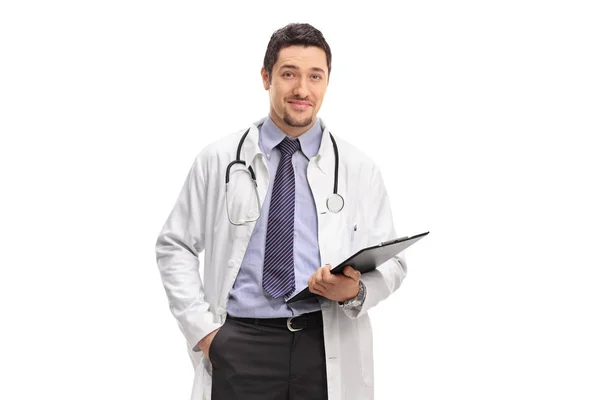 Doctor holding a clipboard and looking at the camera — Stock Photo, Image