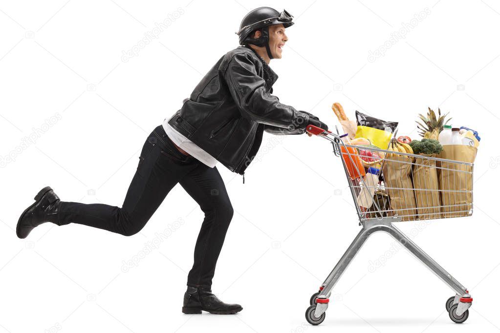 Biker pushing a shopping cart filled with groceries