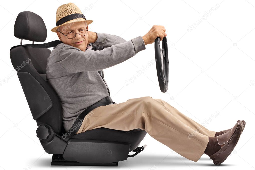 man seated in a car seat experiencing neck pain