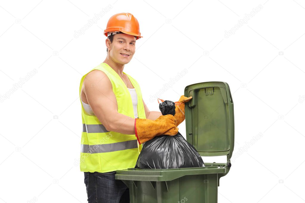 Waste collector emptying a garbage bin