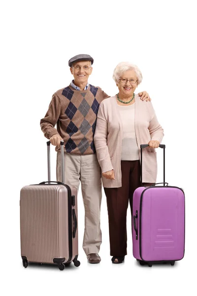 Senior couple with suitcases — Stock Photo, Image